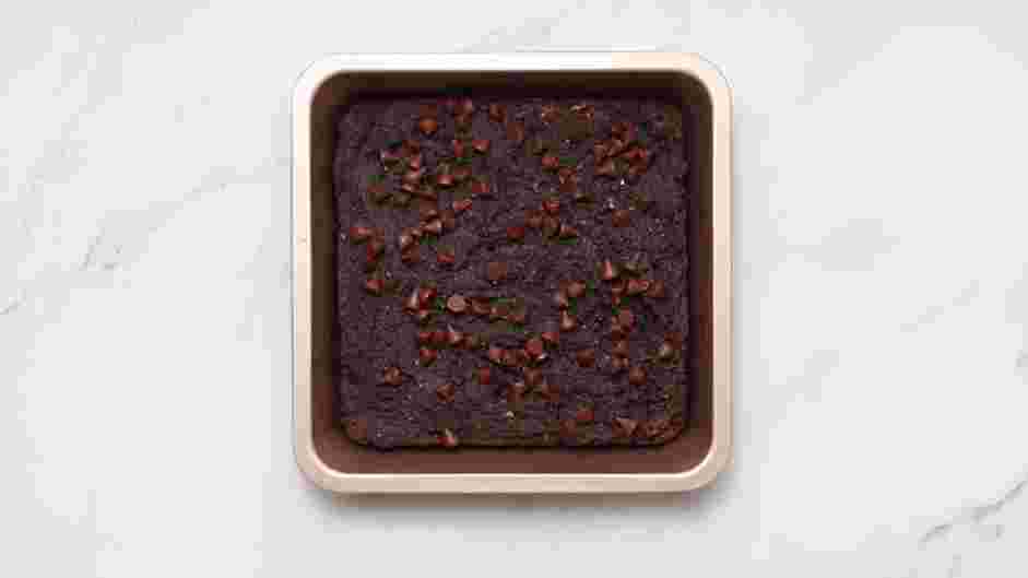Avocado Brownies Recipe: Fold in the pecans with a spatula and spread the avocado brownies in the baking dish.
