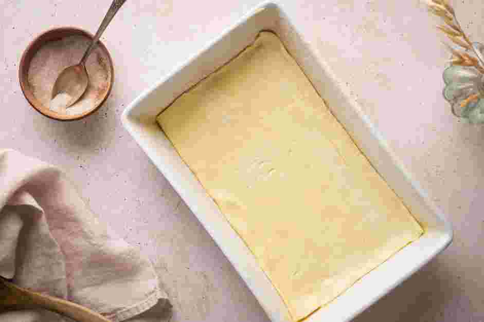 Churro Cheesecake Recipe: Place the rolled-out dough into the baking pan.